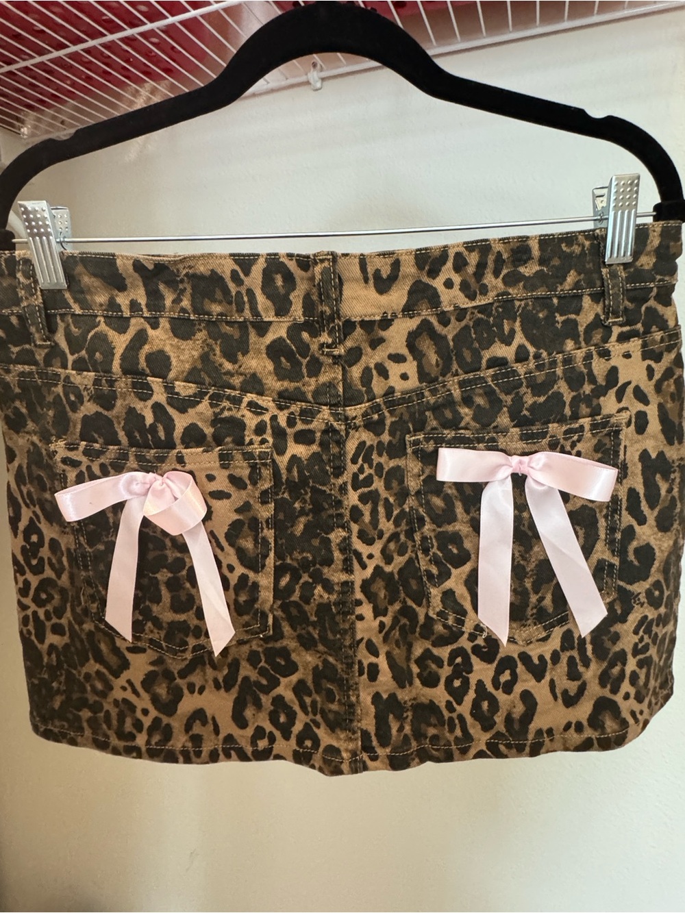 Leopard Print Mini Skirt with Pink Bow Accents